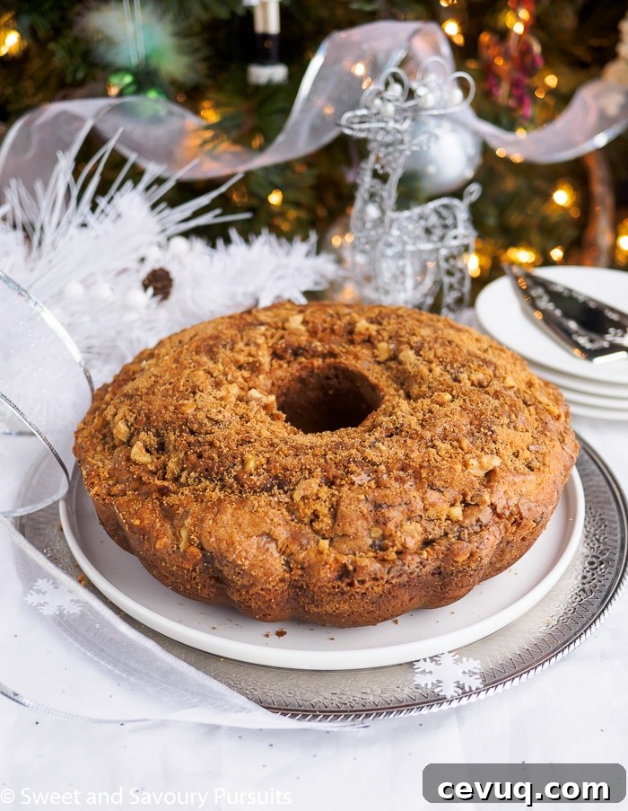Cinnamon swirl bundt cake on platter.