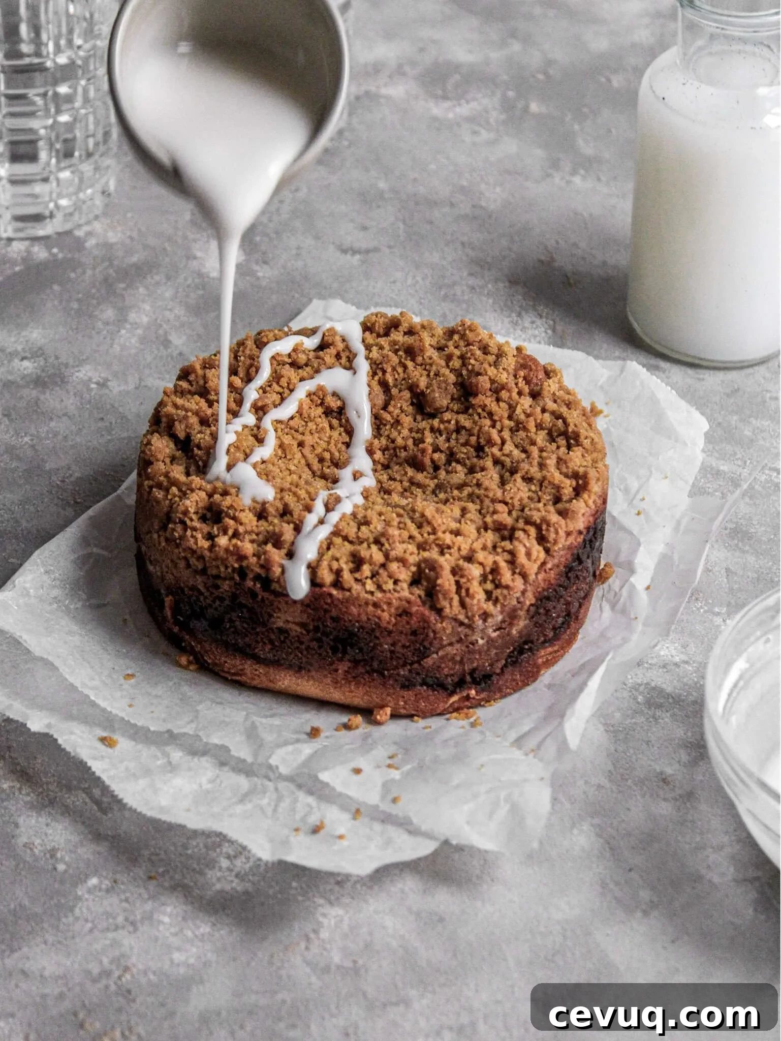 mini coffee cake - drizzling icing over cake