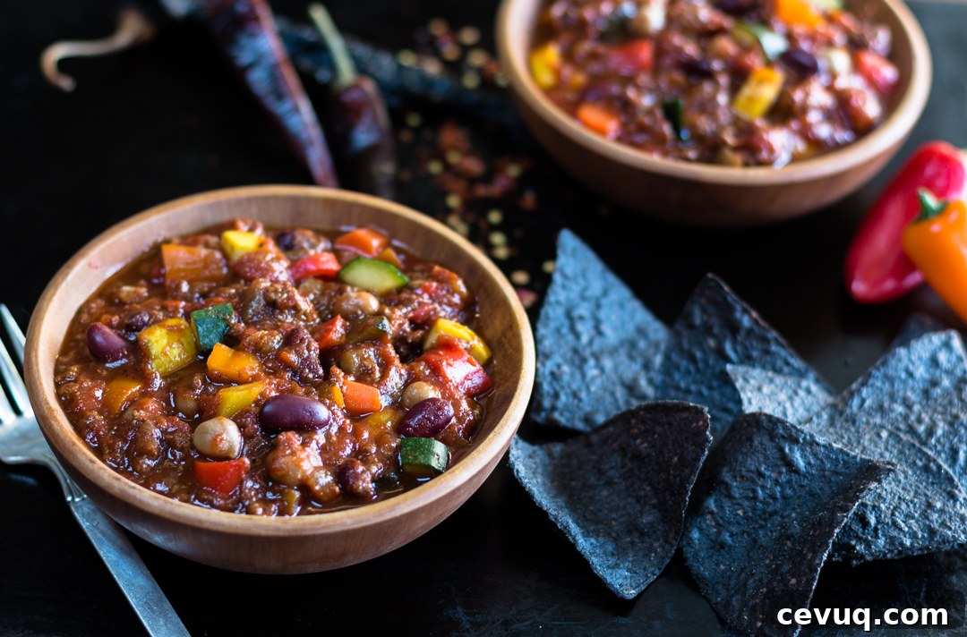 Chili with tortilla and toppings