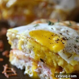 Croque Madame Sandwich with Fried Egg – Classic French Cafe Recipe 6 This croque madame is the perfect combination of bechamel cheese sauce, Canadian bacon and Swiss cheese stuffed between two slices of crusty bread. Perfect for breakfast or dinner.
