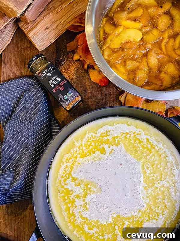 Cobbler batter and melted butter in cast iron pan