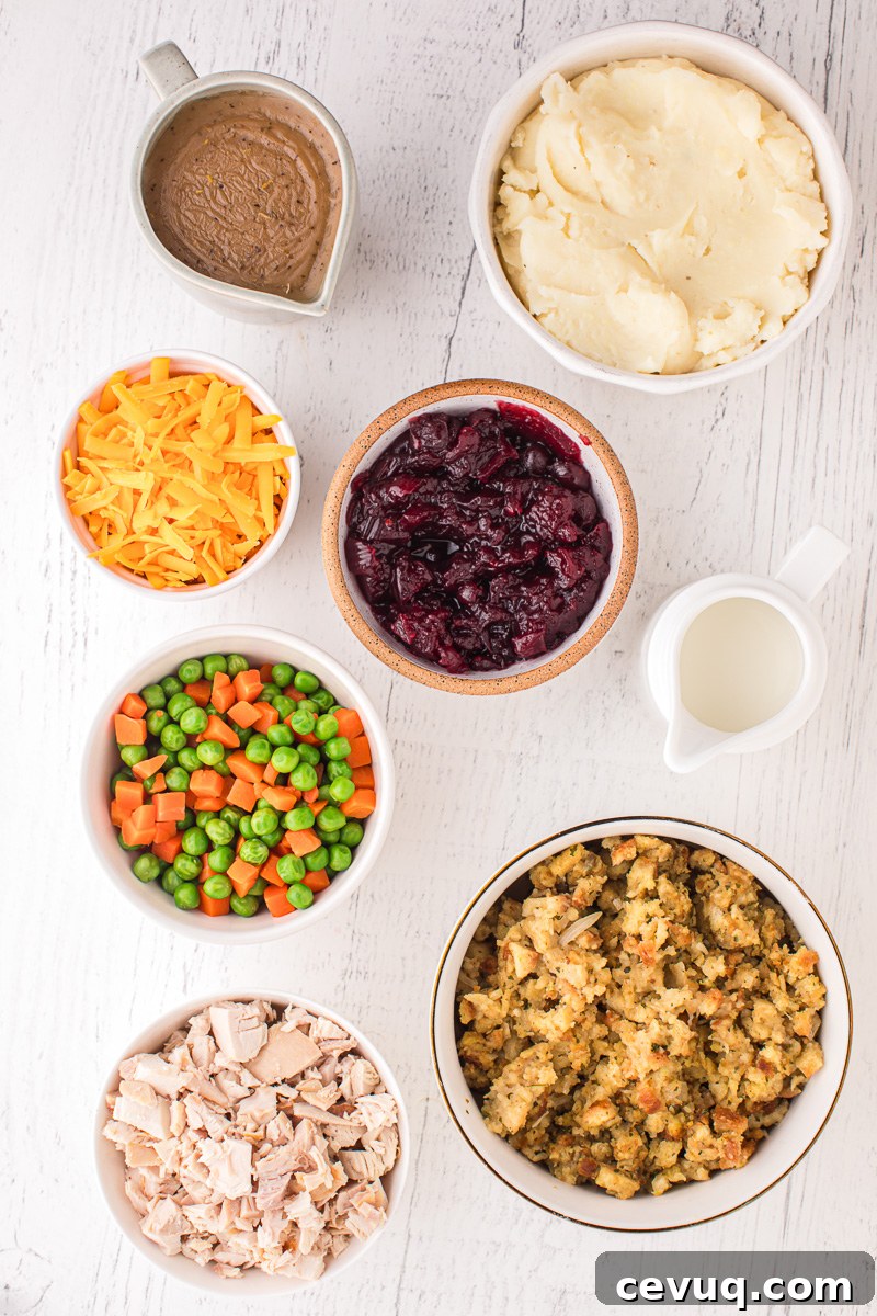 Ingredients for leftover Thanksgiving turkey casserole in small dishes on counter.