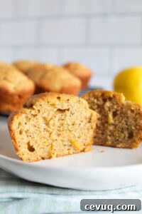 inside of a gluten free lemon poppy seed muffin on a plate