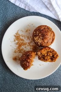 vegan pumpkin muffins on a white plate.
