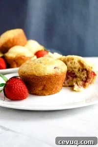 Gluten free strawberry muffins on a white plate