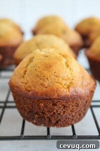 baked gluten free banana muffin on a wire rack.