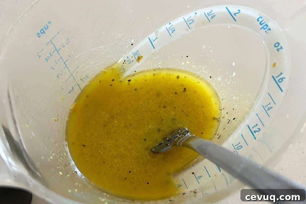 Salad dressing combined in a bowl.