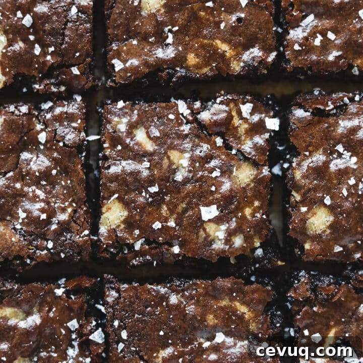 Closeup of browned butter blondie brownies with flaky sea salt.