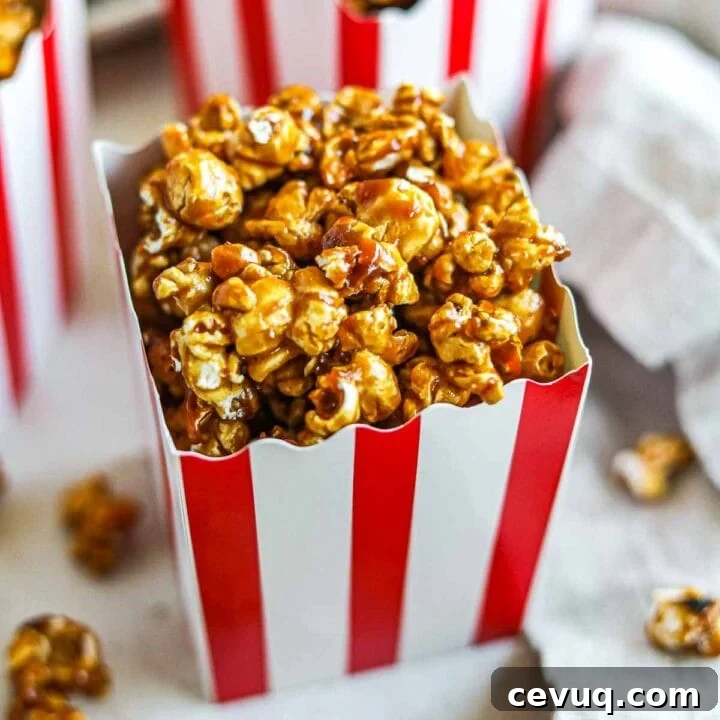 Miso caramel popcorn in small red and white striped movie popcorn boxes.