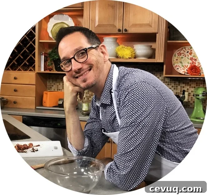 A man leaning on a table