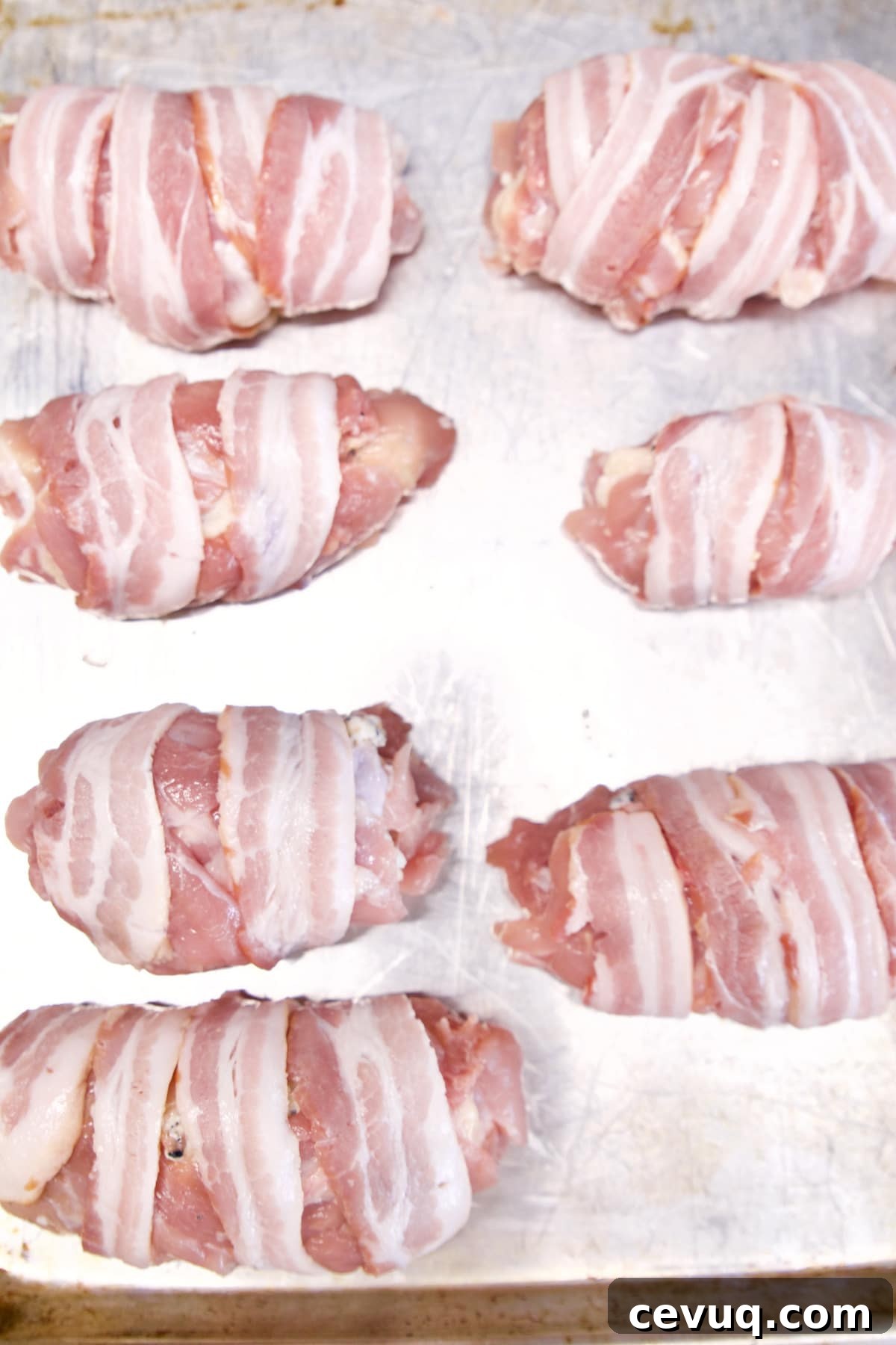 Bacon wrapped chicken rolls.