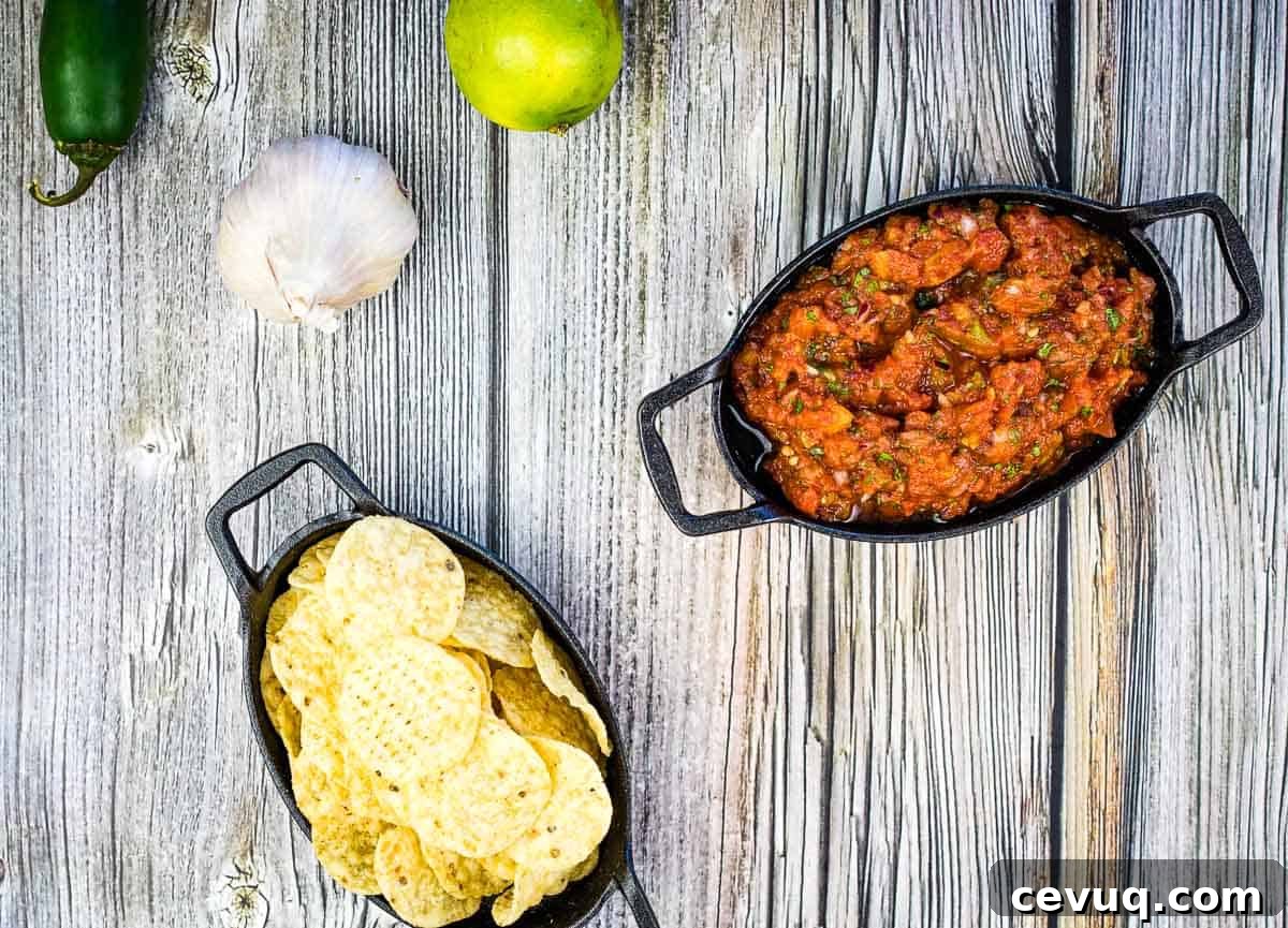 Smoked Tomato Salsa in a black dish.