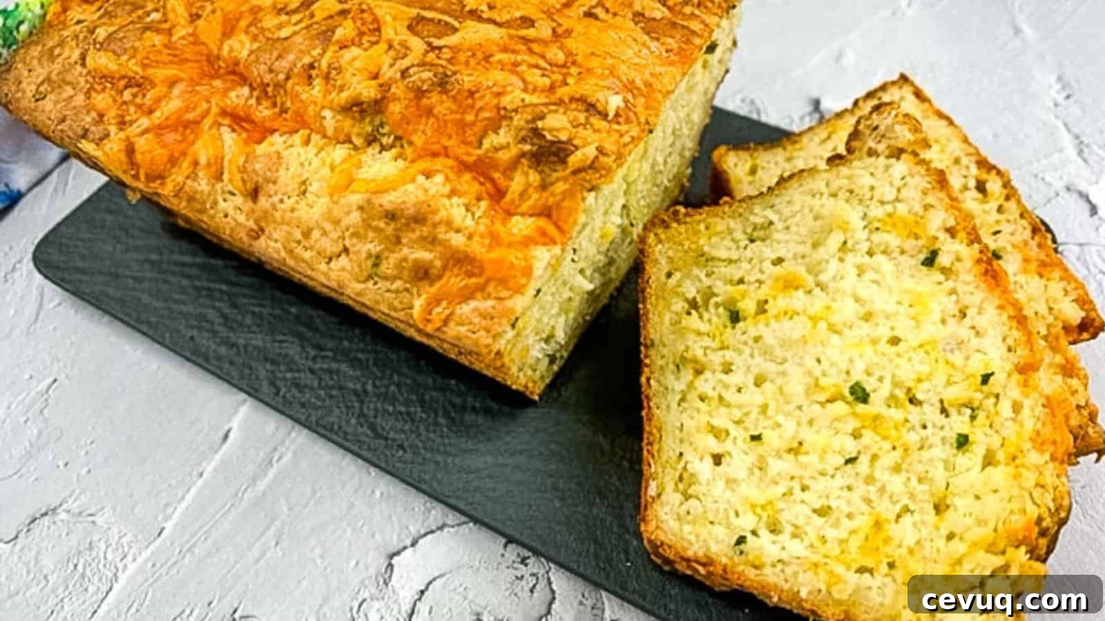 Potato Cheese Bread on a black board.