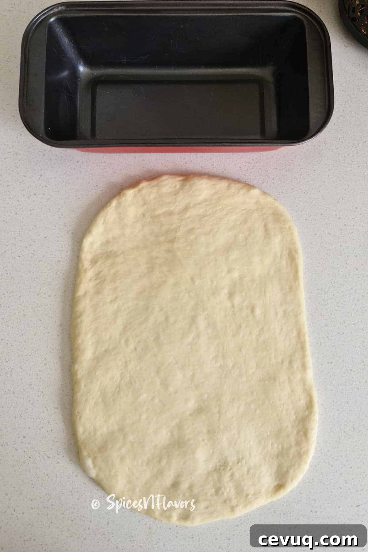 Roll the dough to fit your loaf pan