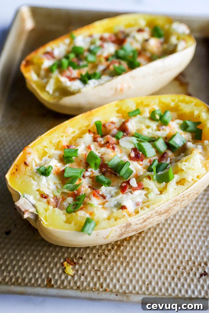 flavors of a deliciously jalapeno popper stuffed spaghetti squash with green onions