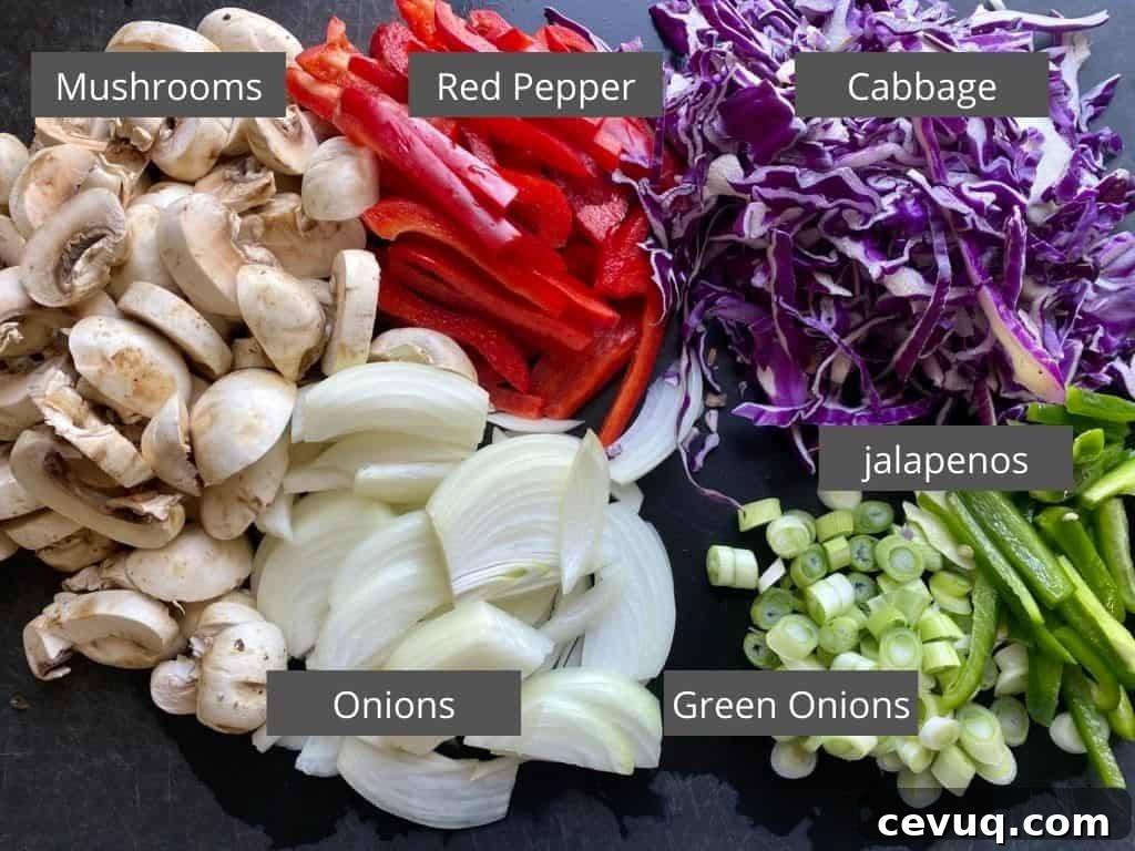 Zoodle Pad Thai ingredients: Mushrooms, red bell pepper, cabbage. jalapenos, green onions, white onions
