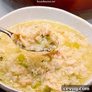Grandma's chicken and rice soup is made from a whole chicken, onions, celery, and rice with seasonings, butter, and Better than Bouillon for spoonfuls of comfort.