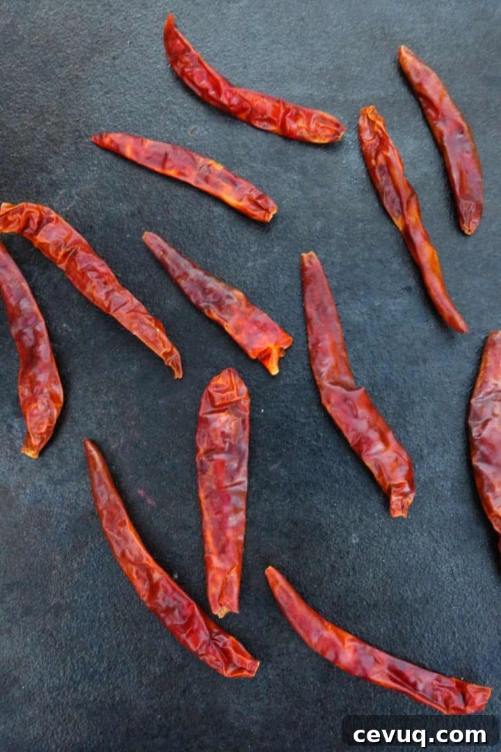 Chiles de arbol on a cast-iron comal
