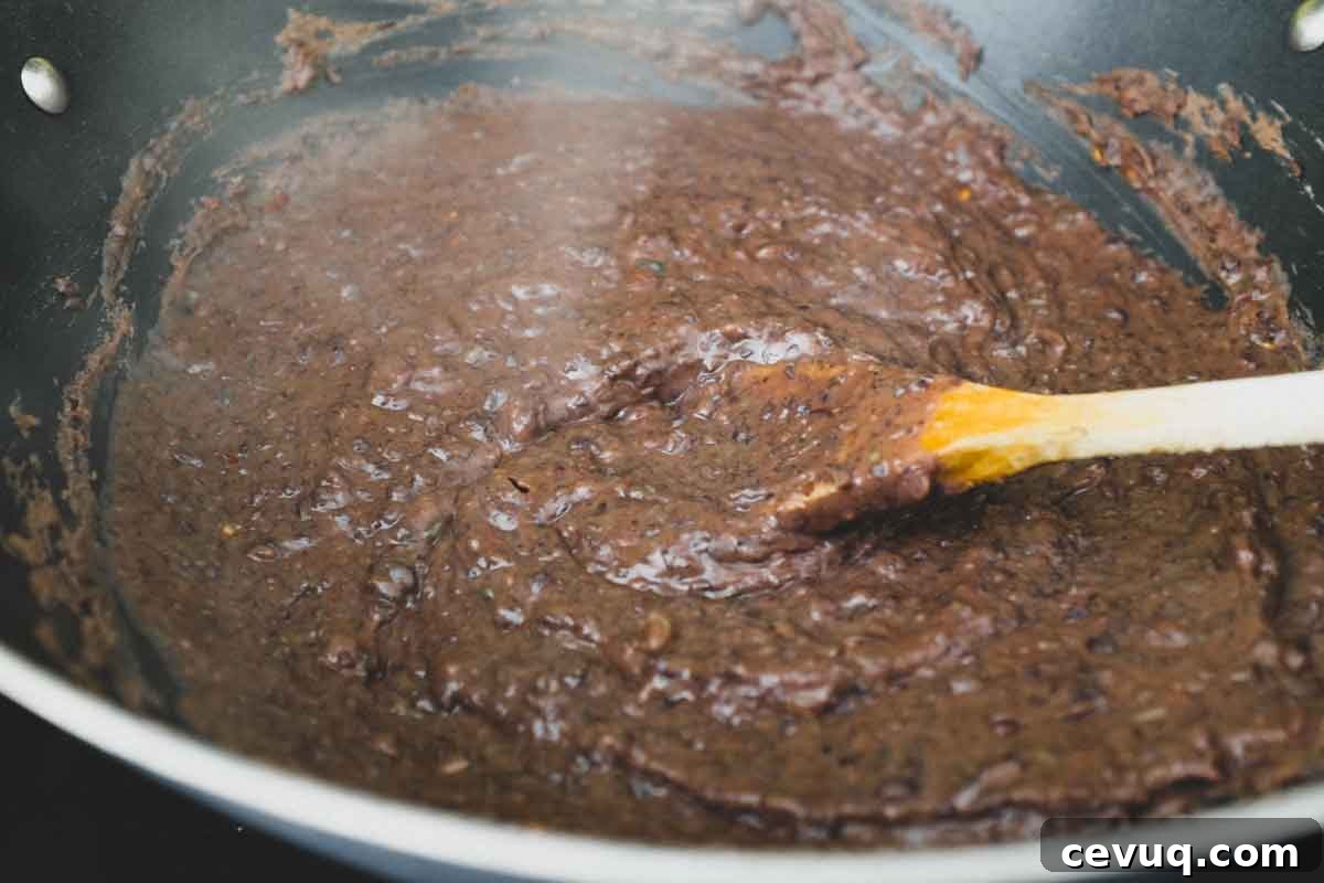 Black beans, pureed and refried for Mexican Tlayudas