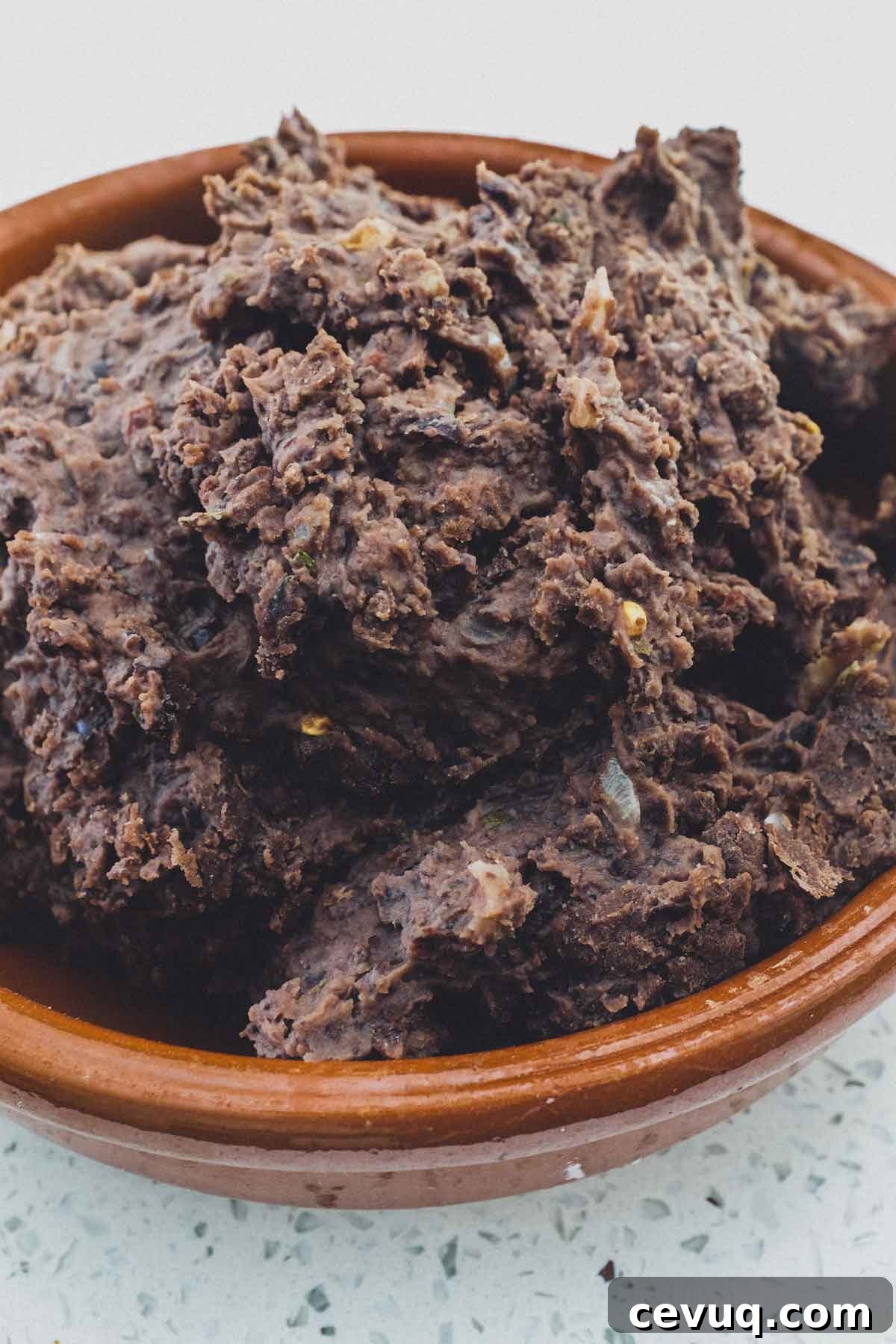 Black beans, pureed and refried for Mexican Tlayudas