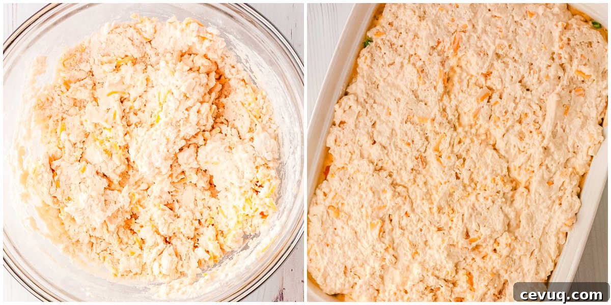 Cheddar biscuit dough mixed in bowl and spread over creamy chicken pot pie filling in 9x13 baking dish.