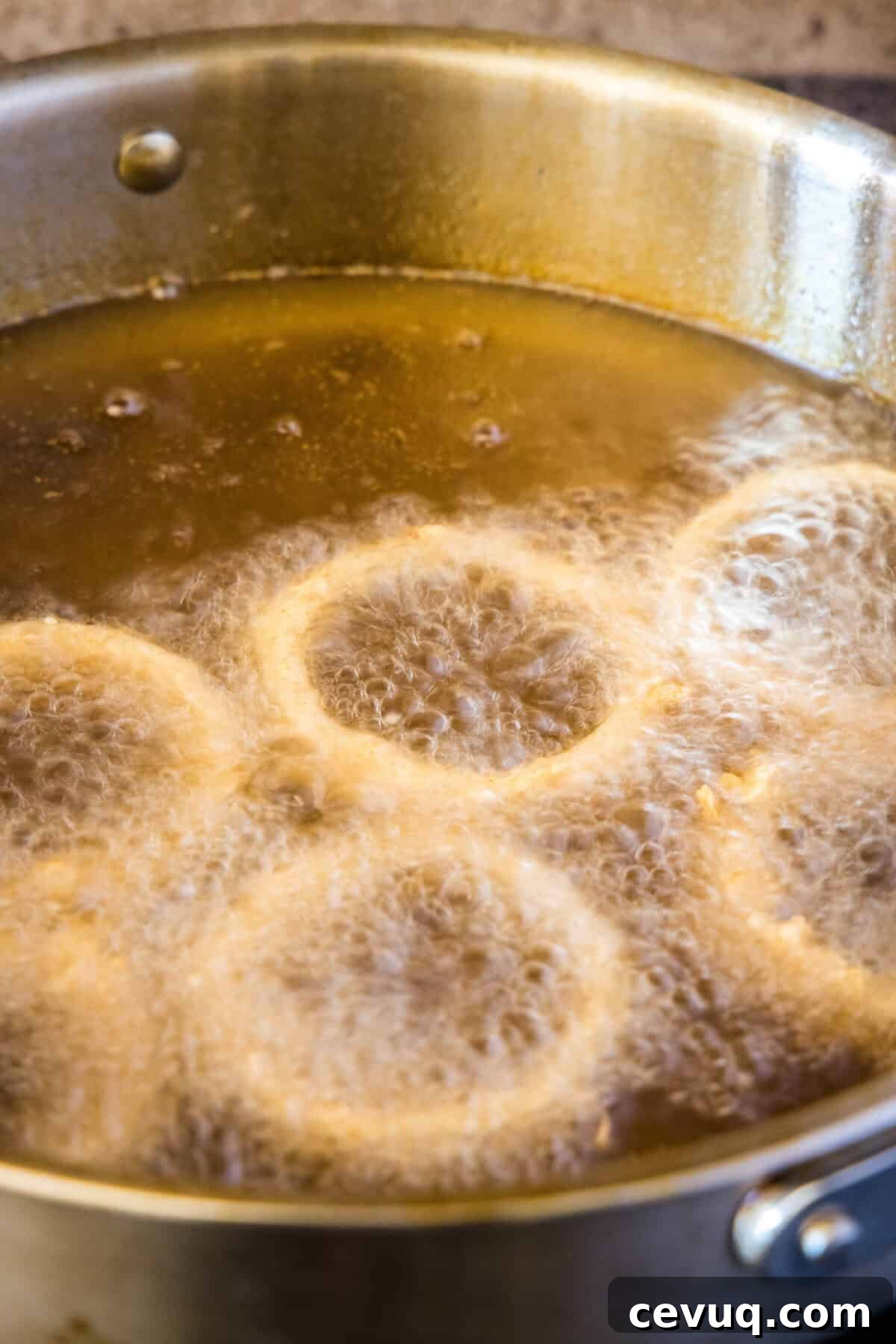 onion rings frying in oil