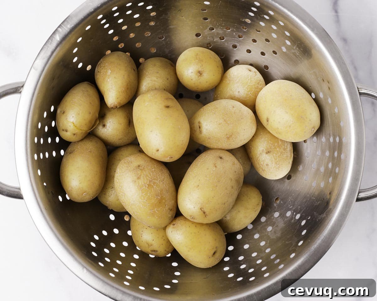 Cooling boiled potatoes on a towel