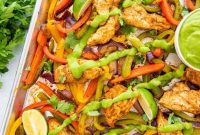 Sheet Pan Chicken Fajitas with Cilantro Avocado Lime Sauce