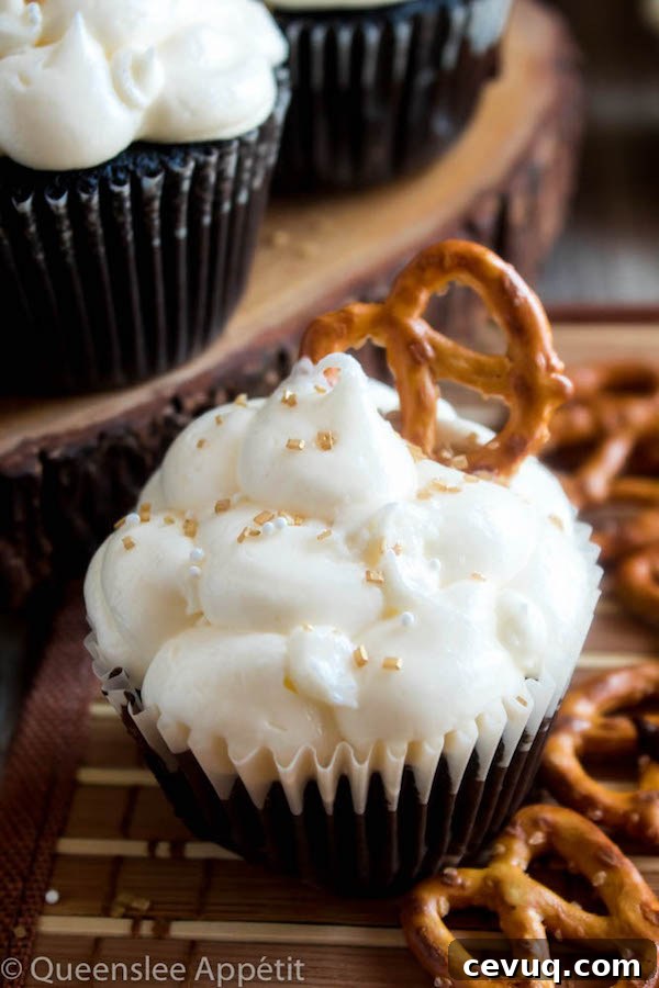 Beer-Infused Pretzel Cupcakes 2 These Beer and Pretzel Cupcakes are made with a salty crunchy pretzel crust, a beer flavoured chocolate cupcake filled with a beer ganache and topped with beer buttercream!