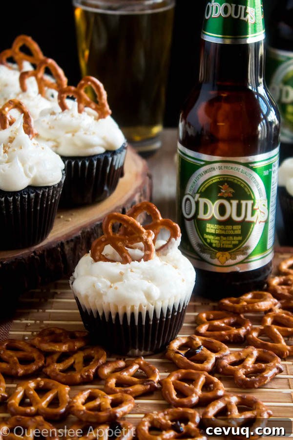 Beer-Infused Pretzel Cupcakes 4 These Beer and Pretzel Cupcakes are made with a salty crunchy pretzel crust, a beer flavoured chocolate cupcake filled with a beer ganache and topped with beer buttercream!