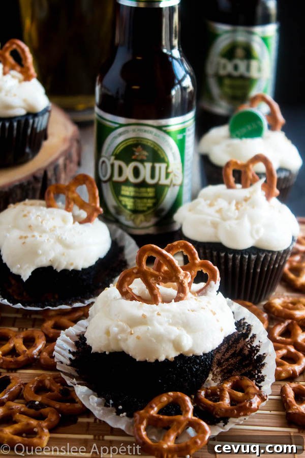 Beer-Infused Pretzel Cupcakes 5 These Beer and Pretzel Cupcakes are made with a salty crunchy pretzel crust, a beer flavoured chocolate cupcake filled with a beer ganache and topped with beer buttercream!