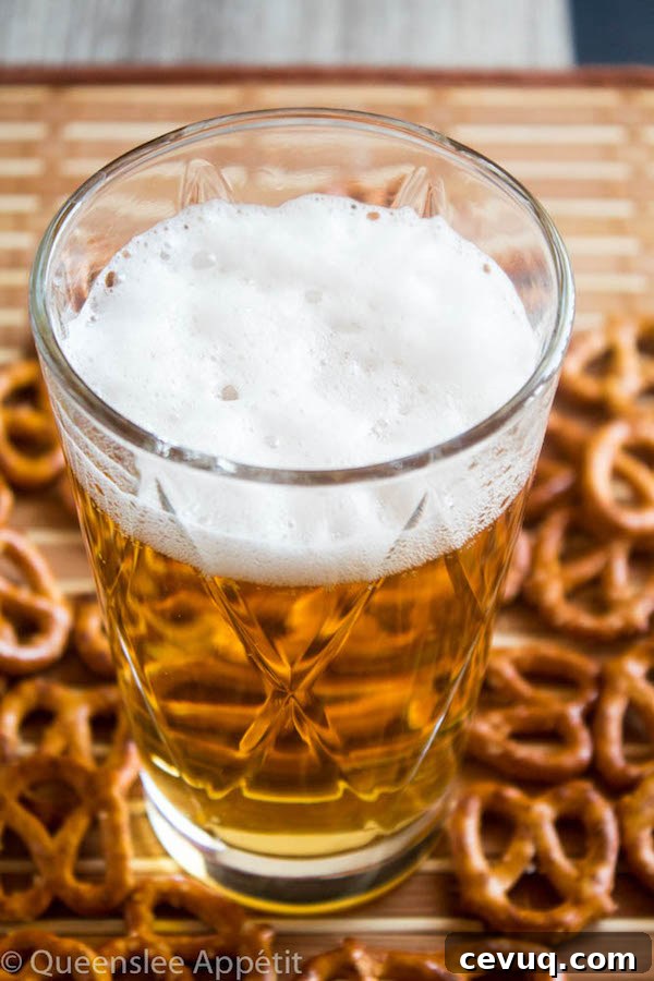 Beer-Infused Pretzel Cupcakes 7 These Beer and Pretzel Cupcakes are made with a salty crunchy pretzel crust, a beer flavoured chocolate cupcake filled with a beer ganache and topped with beer buttercream!