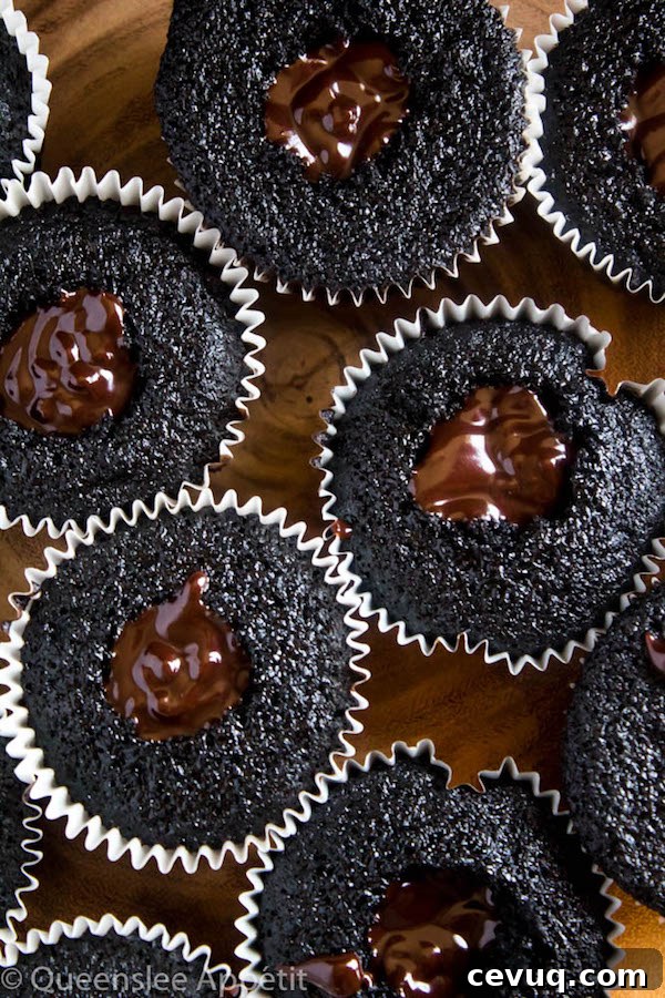 Beer-Infused Pretzel Cupcakes 8 These Beer and Pretzel Cupcakes are made with a salty crunchy pretzel crust, a beer flavoured chocolate cupcake filled with a beer ganache and topped with beer buttercream!