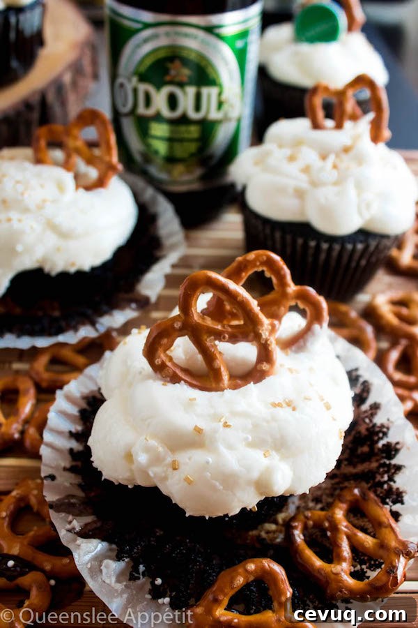 Beer-Infused Pretzel Cupcakes 9 These Beer and Pretzel Cupcakes are made with a salty crunchy pretzel crust, a beer flavoured chocolate cupcake filled with a beer ganache and topped with beer buttercream!