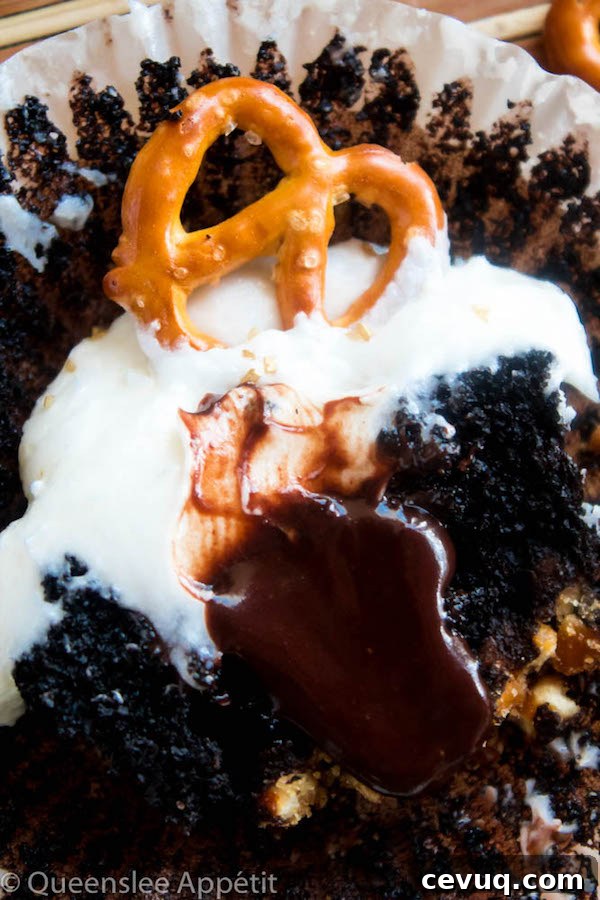 Beer-Infused Pretzel Cupcakes 10 These Beer and Pretzel Cupcakes are made with a salty crunchy pretzel crust, a beer flavoured chocolate cupcake filled with a beer ganache and topped with beer buttercream!