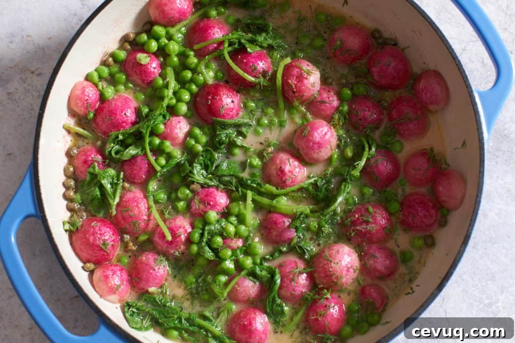 Radish halves with peas and radish greens in white wine mustard sauce.