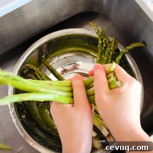 step by step wash and snap woody part of asparagus