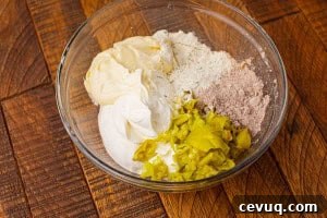 the dip ingredients in a bowl before stirring