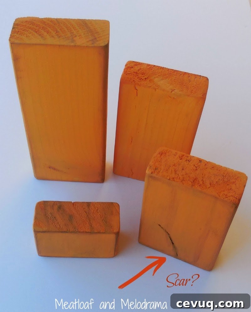four wood blocks painted orange