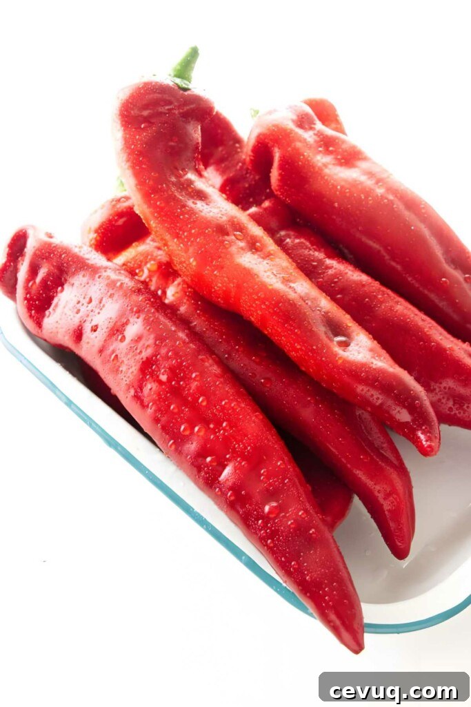 Several washed Italian sweet peppers.