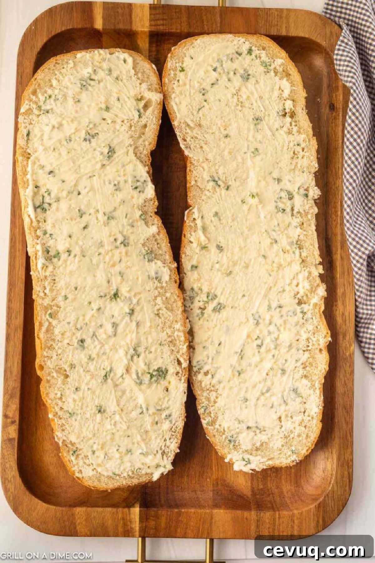 Blackstone Grill Garlic Bread Recipe: Crispy Grilled Loaf 5 Spreading the butter mixture over the French Bread