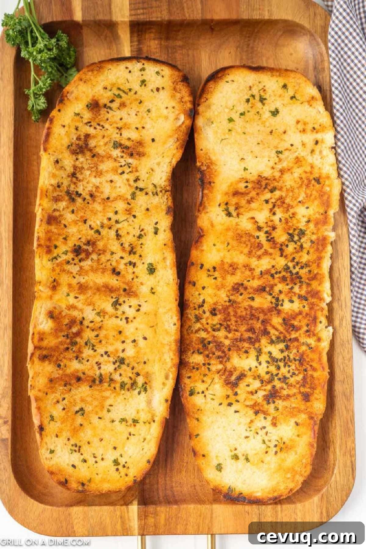 Blackstone Grill Garlic Bread Recipe: Crispy Grilled Loaf 6 Garlic bread on a wooden platter