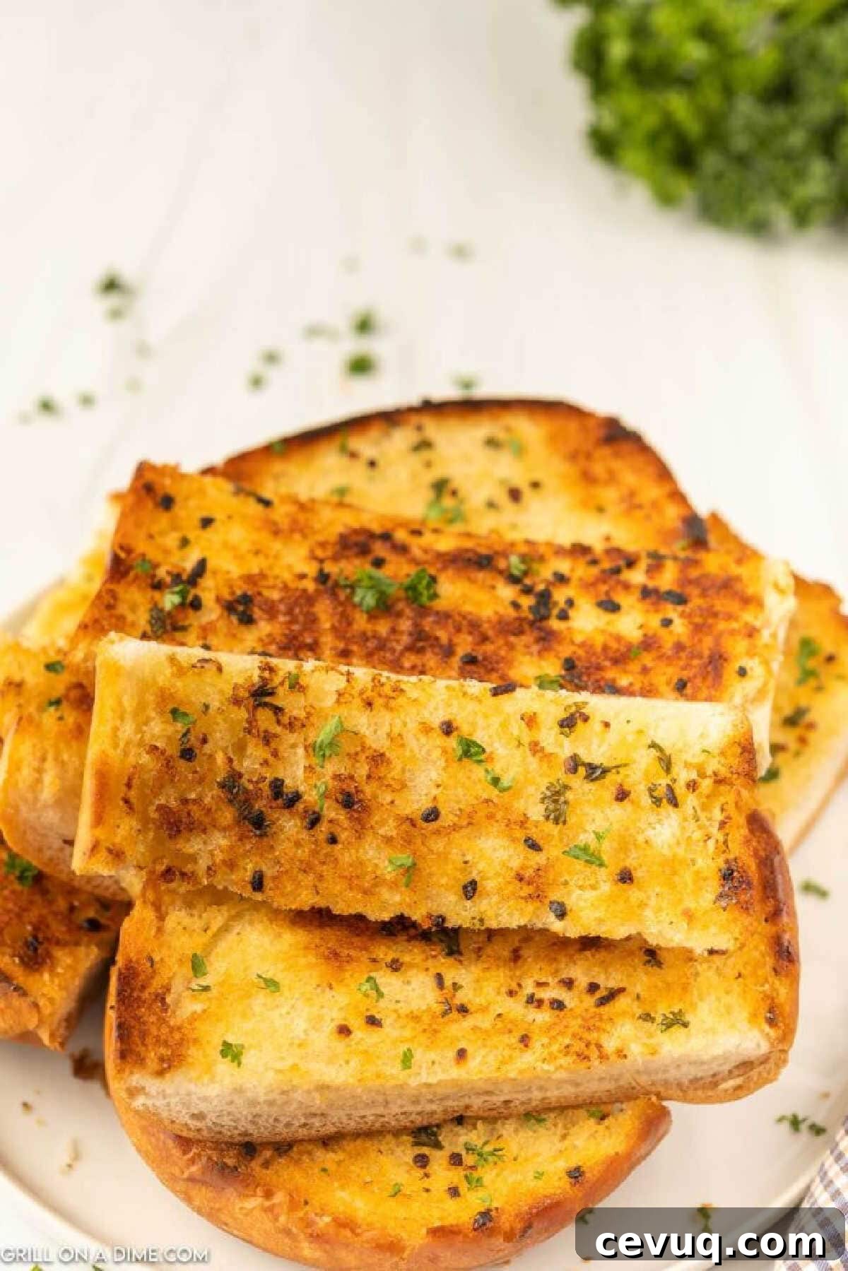 Blackstone Grill Garlic Bread Recipe: Crispy Grilled Loaf 7 Garlic Bread cut into slices
