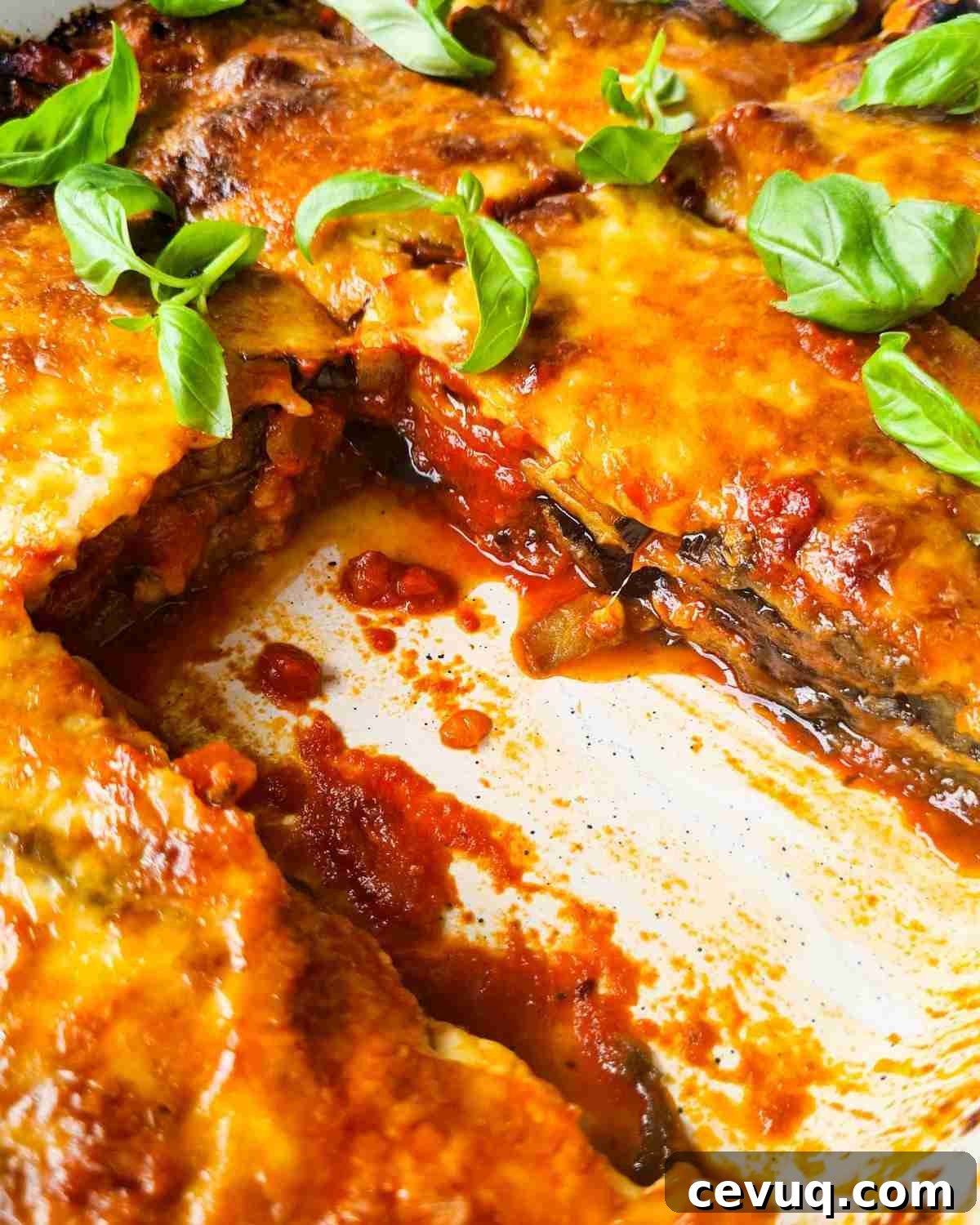 Close up of side view of sliced eggplant parmigiana