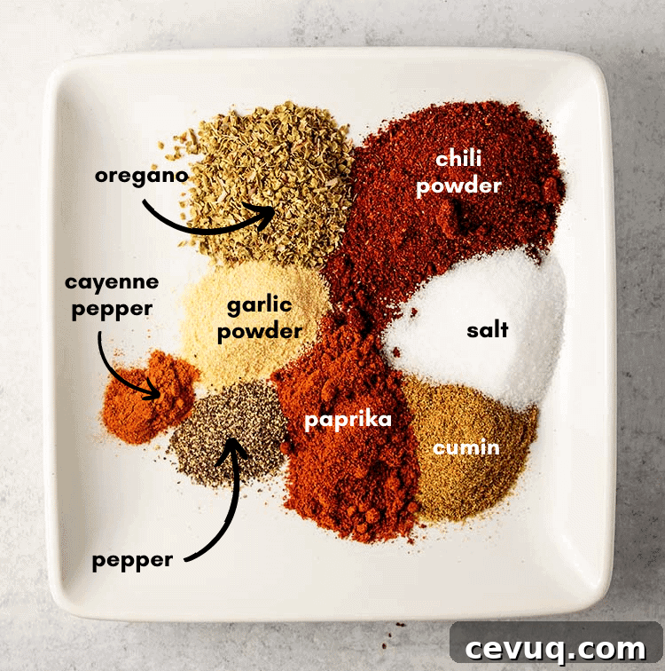 Homemade Chili Seasoning Mix for Authentic, Bold Flavor 2 homemade chili seasoning ingredients on a white plate