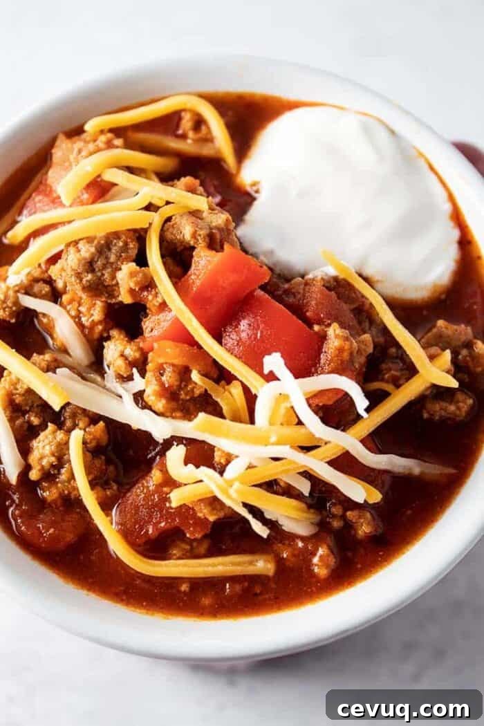 Homemade Chili Seasoning Mix for Authentic, Bold Flavor 7 overhead view of low carb turkey chili with sour cream and cheese on top