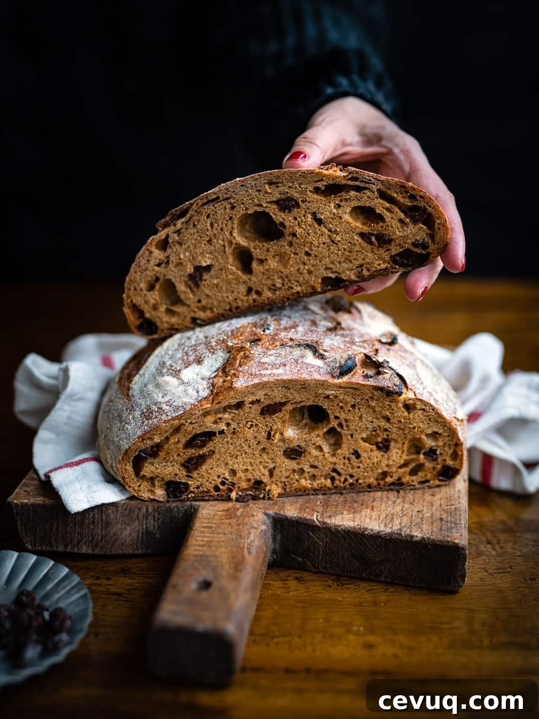 Cinnamon Raisin Sourdough Loaf Recipe 3 Cinnamon raisin sourdough loaf sliced in half to show the bread texture