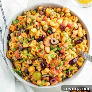 Vegan White Bean Puttanesca Pasta 13 Pasta, white beans, olives and capers with tomatoes and fresh parsley.
