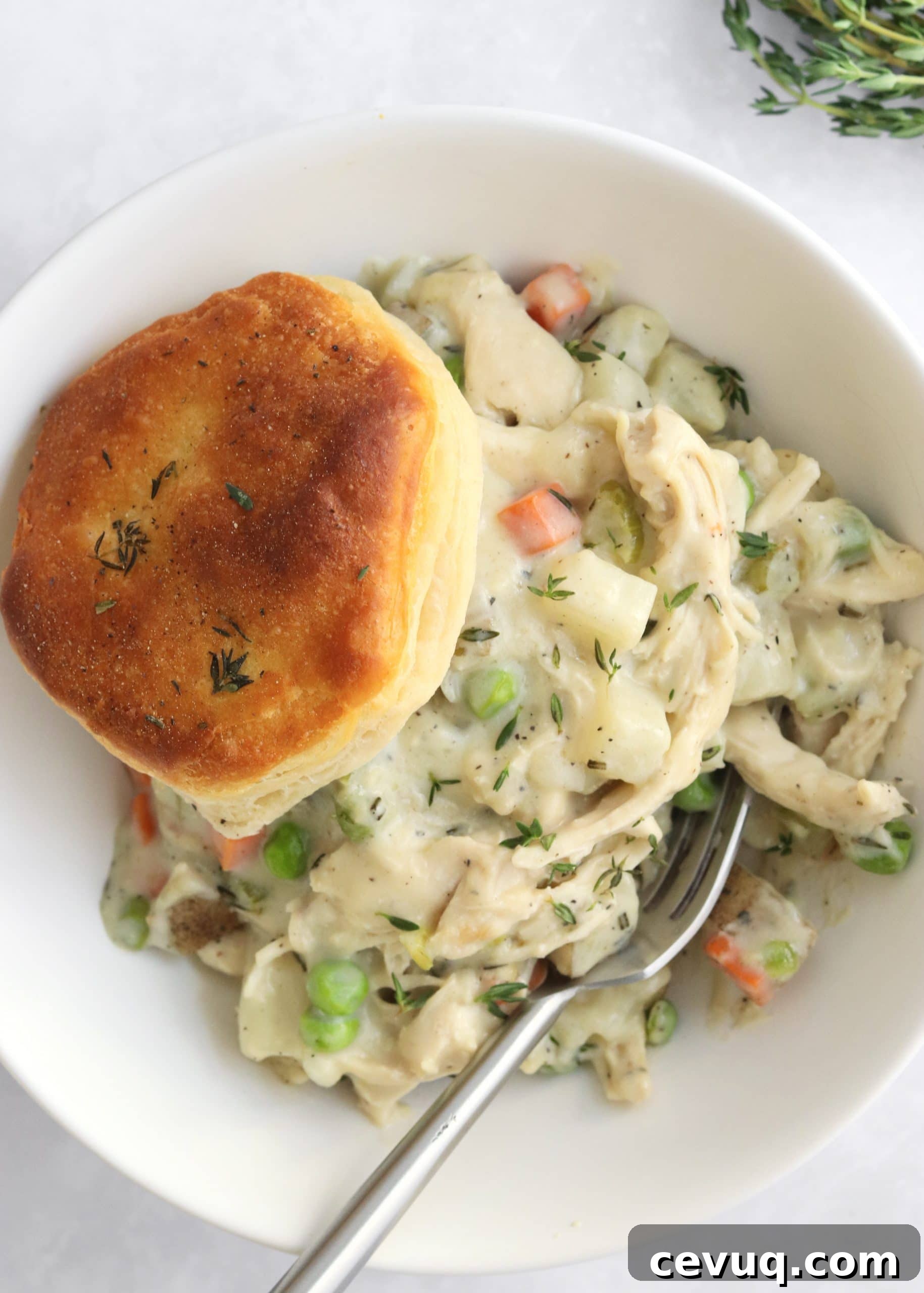 Leftover Turkey Pot Pie Recipe 9 Bowl of leftover turkey pot pie with a biscuit