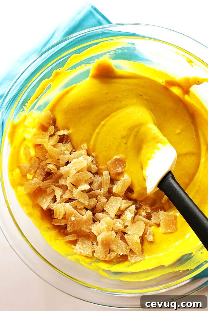 Golden Milk Frozen Yogurt Bark - Adding the crystallized ginger. Gluten Free